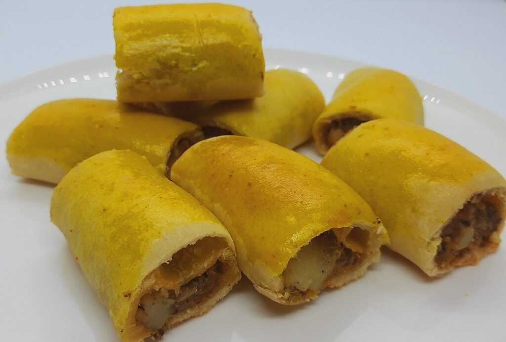 Home-made baked rolls in a plate