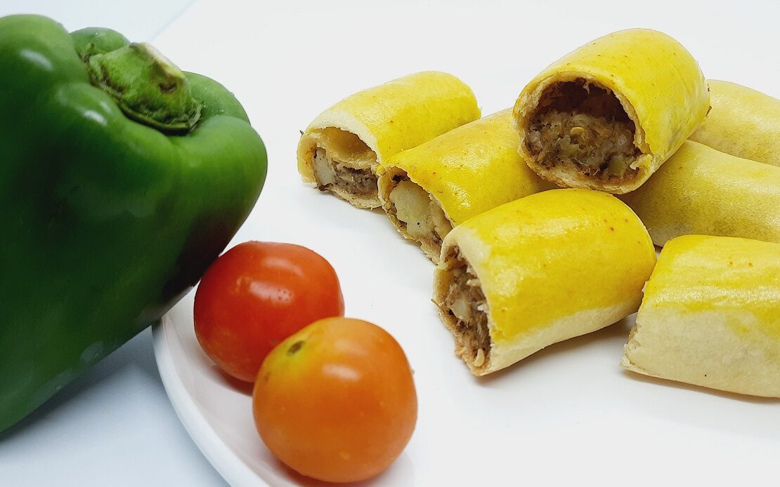 Home-made baked rolls with bell pepper and tomato
