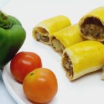 Home-made baked rolls with bell pepper and tomato