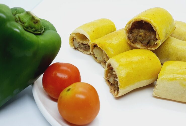 Home-made baked rolls with bell pepper and tomato